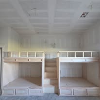 Custom built-in bunk beds with stairs